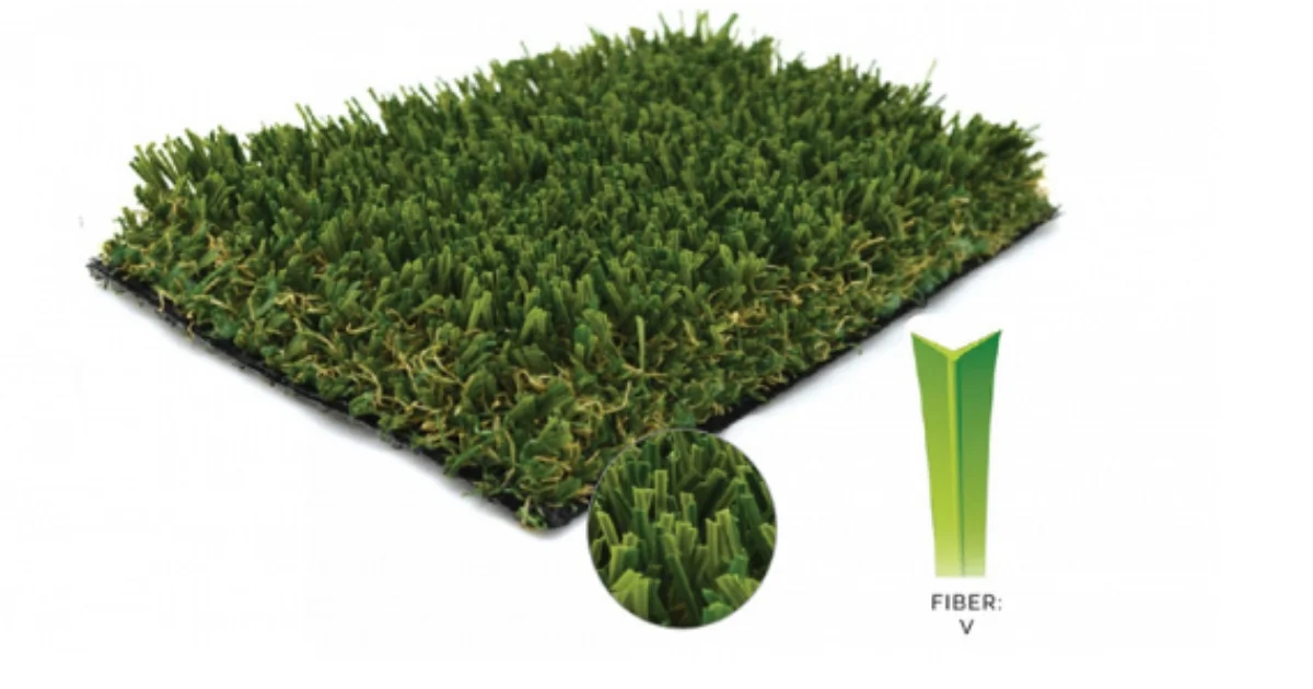 Close-up of a sample square of artificial grass with V-shaped fibers.